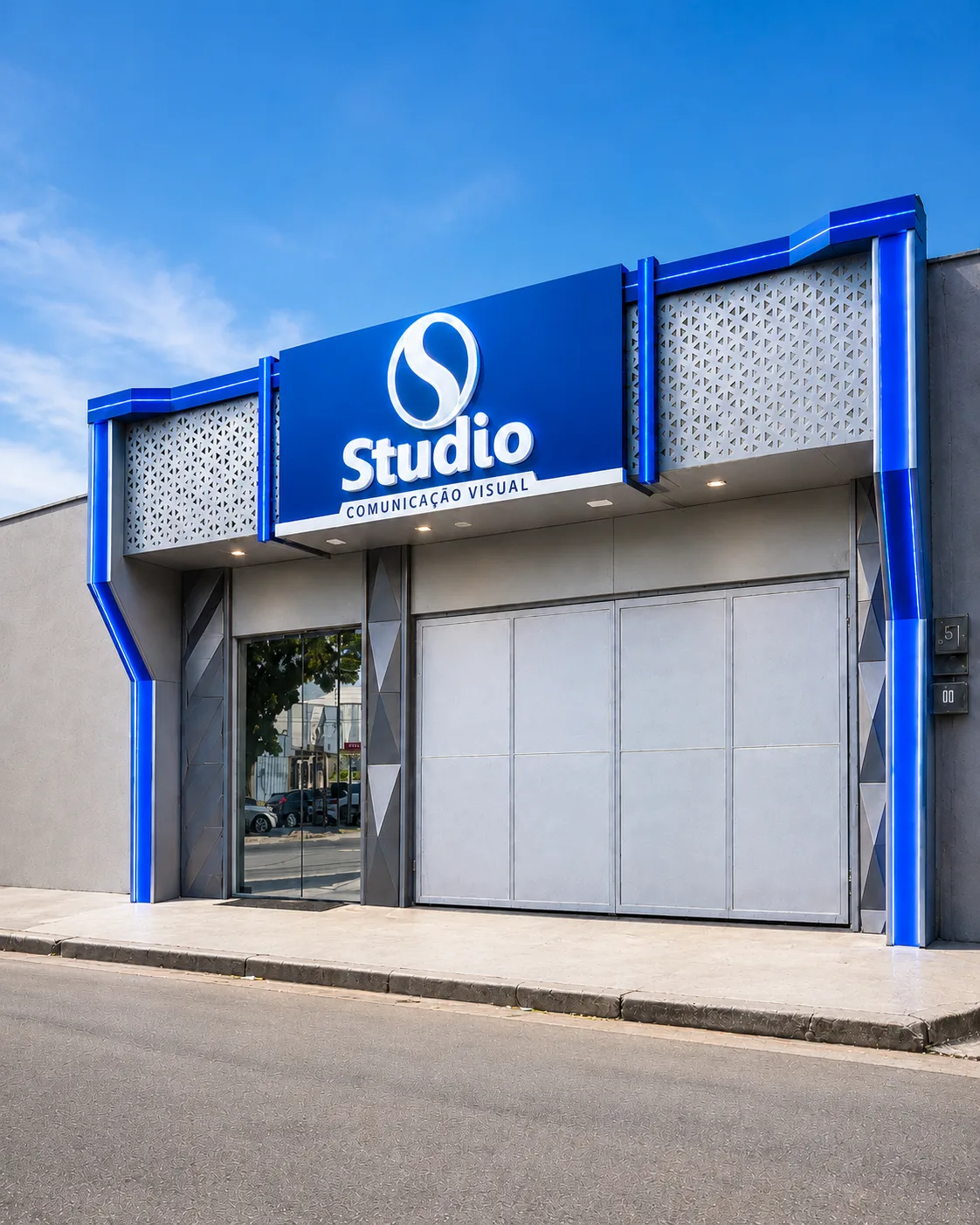 Fachada da Studio Comunicação Visual ambientada em uma cena noturna azul